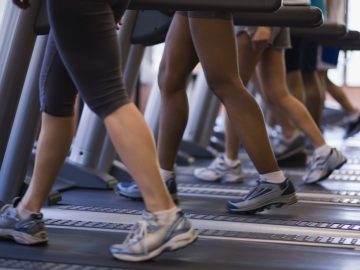 People on treadmills in gym