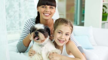 Mother, daughter and pet