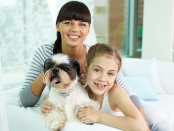 Mother, daughter and pet